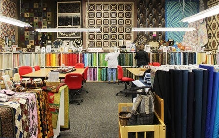 Calico Hutch Quilt Shop in Hayward began 34 years ago. It showcases dozens of different quilts on the walls and hundreds of different types of fabric. Sarah Stultz/Albert Lea Tribune