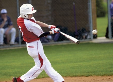 Forrest Lewis makes solid contact for the Packer baseball team against Red Wing in Seltz Field Tuesday. Rocky Hulne/sports@austindailyherald.com