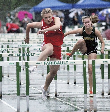 Austin’s Rachel Quandt won her second straight Big Nine title in the 100-meter hurdles in Faribault Friday. Adam Holt/Faribault Daily News