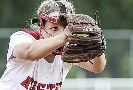 Austin pitcher Hannah Rasmussen looks home as she pitches against Stewartville in the Section 1AAA Tournament Wednesday night at Todd Park. Eric Johnson/photodesk@austindailyherald.com