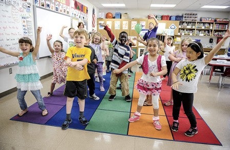 Students in the Red Cricket class bust a move for their portion of “Critter Party,” for the annual Woodson video. Eric Johnson/photodesk@austindailyherald.com