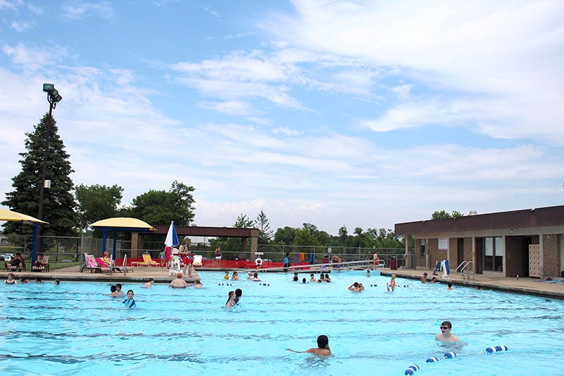 A splash into summer; Austin Municipal Swimming Pool opens for the ...