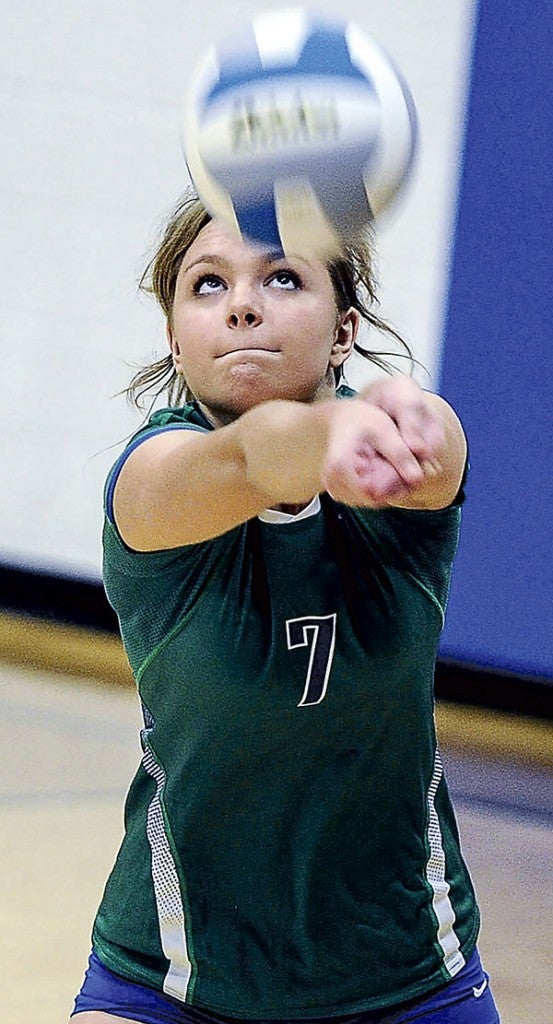 Lyle-Pacelli’s Faith King keeps an eye on the ball Thursday night against Hope Lutheran in Lyle. Eric Johnson/photodesk@austindailyherald.com