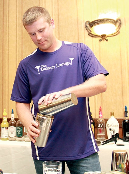 Curtis Sorenson of the bakery mixes a drink.