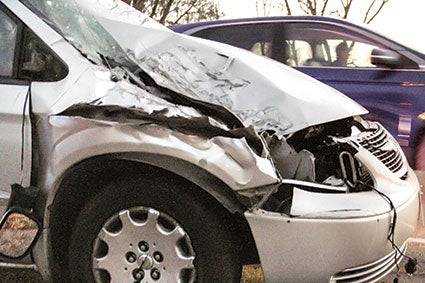 A van rear ended a school bus on U.S. Highway 218 near the Cedar Valley Conservation Club.