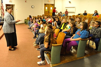 Dr. Rebecca Morris of the Hormel Institute, working in stem cell research and discussed her early love of science during the Science Fair Mentoring kickoff Thursday at the Neveln Elementary School. 