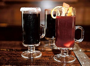 Three holiday drinks were popular in the Victorian era including the Hot Gin Punch, right, Smoking Bishop, left, and mulled wine, back. Eric Johnson/Austin LIving