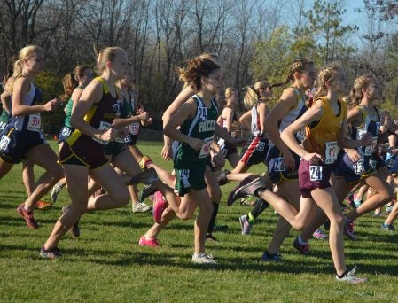 Kayla Christopherson runs at the Class A state meet. Rocky Hulne/sports@austindailyherald.com