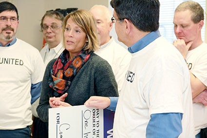 United Way Director Diane Baker thanks the Quality Pork Processors workers for giving $141,000 to the United Way’s annual drive during a Wednesday meeting at QPP. 