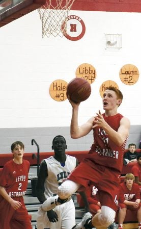 LeRoy-Ostrander’s Trey Hungerholt attacks the basket in LeRoy Thursday. Rocky Hulne/sports@austindailyherald.com