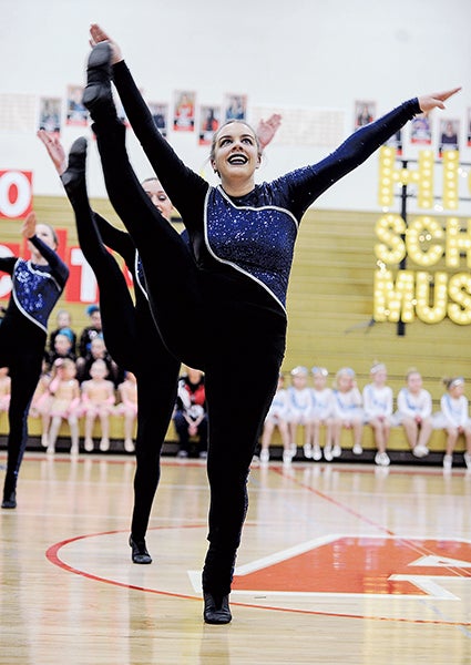 Cally Heiny performs with the Austin Packer Dance Team Saturday during the Austin Packer Dance Team Show in Packer Gym. 