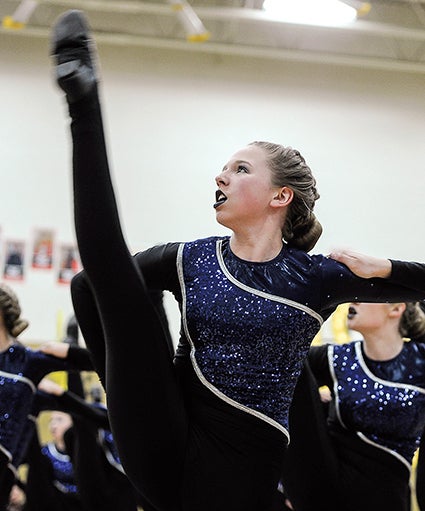 Austin Packer Dance Team’s Ellie Eyre kicking it Saturday during the Austin Packer Dance Team Show in Packer Gym. 