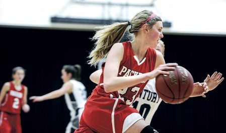 Austin’s Abby Lewis on the drive in the first half against Rochester Century. Eric Johnson/photodesk@austindailyherald.com