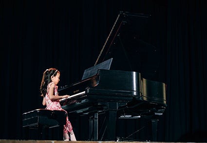 Beginner champion Gabby Wang performs during the final competition of the 2017 Harris Piano Competition. 