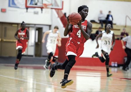 Austin’s Rebecca Younis speeds down the court during the second half against Rochester Mayo Tuesday night in Ove Berven Gym. Eric Johnson/photodesk@austindailyherald.com