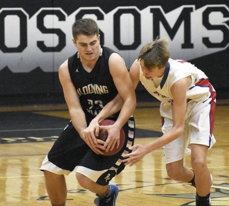 Blooming Prairie’s Max Romeo and Southland’s Thomas Bottema battle for possession in BP Monday. Rocky Hulne/sports@austindailyherald.com