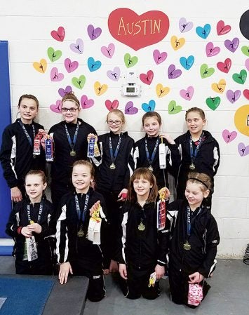 This past weekend the three YMCA gymnastics teams competed at Pillsbury Gymnastics Club in Owatonna. Each team competed in separate divisions.  Pictured is Team 3 which took home first place in its division. Team 2 also took home first place and Team 1 took second place. Pictured: (back row, left to right): Chloe McCarthy. Payton Gilmer, Brylee Wynia, Kathryn Crouch and Isabella Bolster; front row: Reese Norton, Sydney Kokot  Maddy Maricle, and Lucy Otto. Photo Provided 