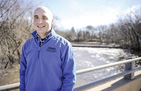 Tim Ruzek of the Cedar River Watershed District is hoping to bring further awareness to the waterways in the area through historical photos. Eric Johnson/photodesk@austindailyherald.com