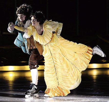 Amy Stoulil as Belle and Hunter Guyette as the Beast perform during the song “Be Our Guest,” from “Beauty and the Beast.” 