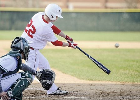 Austin’s Pete Conner takes a cut against Faribault at Dick Seltz Field Tuesday evening. Eric Johnson/photodesk@austindailyherald.com