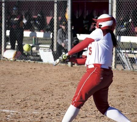 Hannah McMasters gets a hold of a pitch against Northfield in Todd Park Thursday. Rocky Hulne/sports@austindailyherald.com