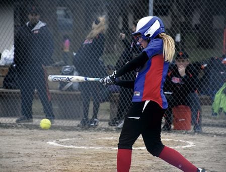 Southland’s Ashlynn Mandt connects on a pitch against Saint Charles in Rose Creek Monday. Rocky Hulne/sports@austindailyherald.com